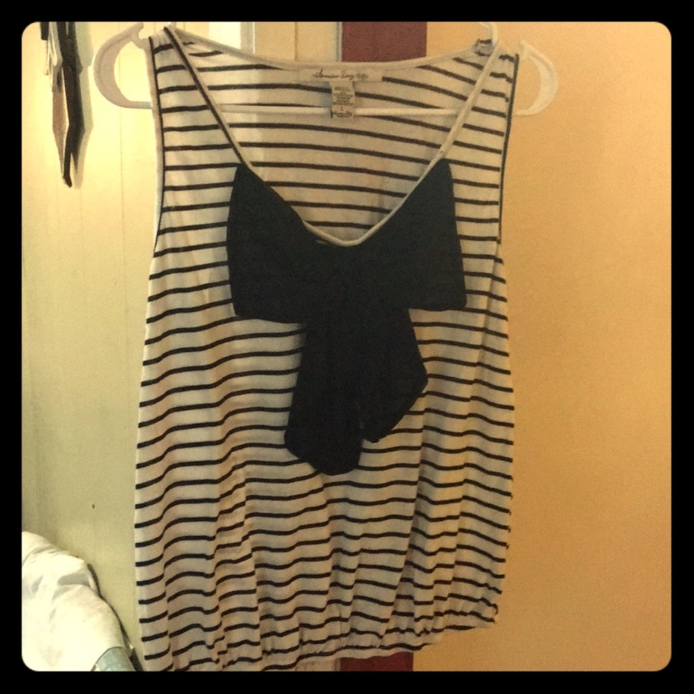 Cute striped shirt with cute bow on the front!!